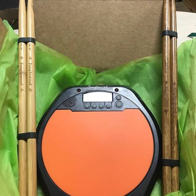 Electronic Drum Pad with Two Pairs of Sticks